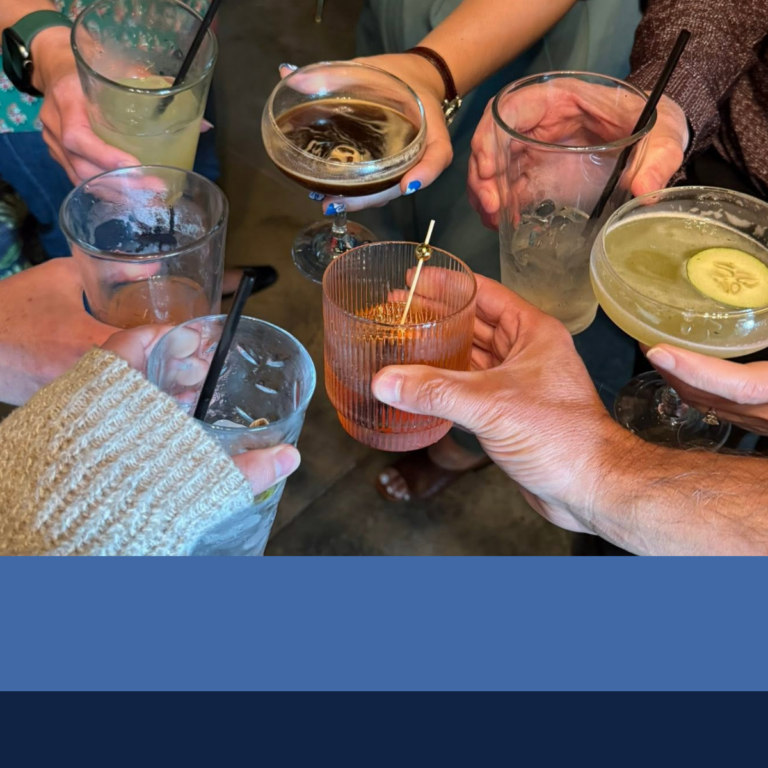 This is a graphic that shows hands holding wine glasses